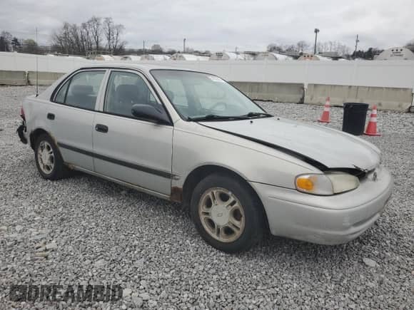 1999 Chevrolet Prizm with VIN 1Y1SK5488XZ406397, listed as a Copart auction lot 51259825 with 146,284 mi miles and Salvage title. Bid and sale history available at DreamBid. Image 4.