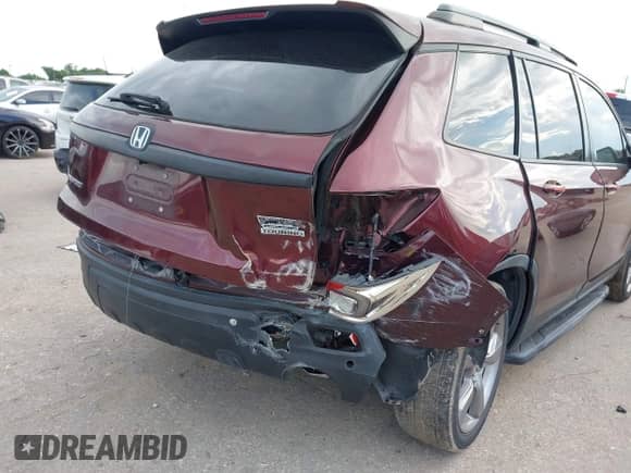2019 Honda Passport Touring with VIN 5FNYF7H95KB004417, listed as a IAAI auction lot 42551496 with 62,948 mi miles and . Bid and sale history available at DreamBid. Image 6.