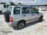2002 Chevrolet Tracker с VIN 2CNBE13C826912290, выставлен на аукционе Copart как лот 69659335 с пробегом 153 495 миль миль и Списание • Salvage title. История ставок и продаж доступна на DreamBid. Изображение 3.