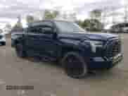 2024 Toyota Tundra Limited Hybrid with VIN 5TFWC5DB9RX048076, listed as a Copart auction lot 90012975 with 19,052 mi miles and Salvage title. Bid and sale history available at DreamBid. Image 4.