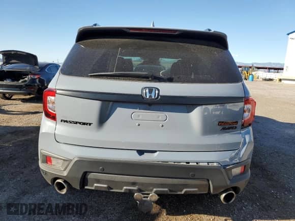 2022 Honda Passport TrailSport with VIN 5FNYF8H64NB025971, listed as a Copart auction lot 82236885 with 28,874 mi miles and Salvage title. Bid and sale history available at DreamBid. Image 6.