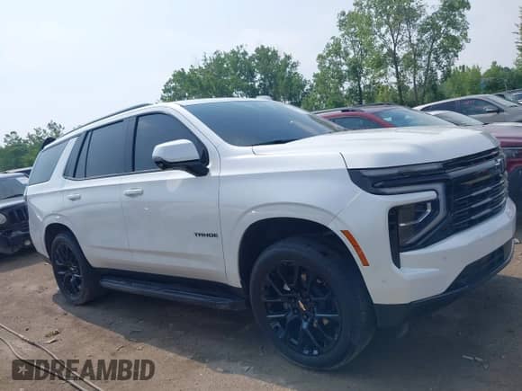 2025 Chevrolet Tahoe RST z VIN 1GNS6RRD7SR121714, wystawiony jako IAAI lot #42602552 z przebiegiem 9 824 mil mil oraz . Historia ofert i sprzedaży dostępna na DreamBid. Obrazek 13.