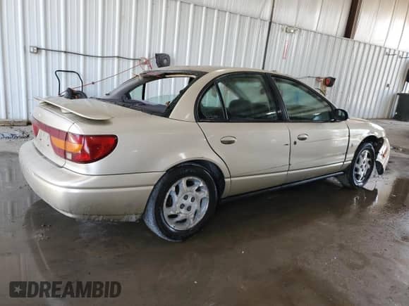 2000 Saturn SL with VIN 1G8ZK5271YZ182706, listed as a Copart auction lot 70810135 with 180,566 mi miles and Salvage title. Bid and sale history available at DreamBid. Image 3.