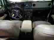 2021 Jeep Wrangler Unlimited Sahara Altitude with VIN 1C4HJXEG4MW633909, listed as a Copart auction lot 66879555 with 32,609 mi miles and Salvage title. Bid and sale history available at DreamBid. Image 8.