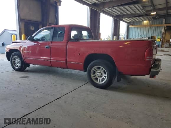 2001 Dodge Dakota Sport с VIN 1B7GL22N01S275917, выставлен на аукционе Copart как лот 72085545 с пробегом 183 812 миль миль и Списание • Salvage title. История ставок и продаж доступна на DreamBid. Изображение 2.