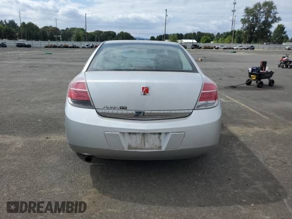 2009 Saturn Aura XR with VIN 1G8ZV57B99F116055, listed as a Copart auction lot 67417234 with 1,122,671 mi miles and Salvage title. Bid and sale history available at DreamBid. Image 6.