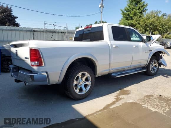 2014 Ram 1500 Laramie z VIN 1C6RR7VM8ES288421, wystawiony jako Copart lot #68515735 z przebiegiem 116 639 mil mil oraz Szkoda całkowita • Salvage title. Historia ofert i sprzedaży dostępna na DreamBid. Obrazek 3.
