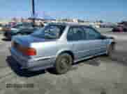 1990 Honda Accord LX with VIN JHMCB7652LC076386, listed as a Copart auction lot 57727165 with 245,375 mi miles and Salvage title. Bid and sale history available at DreamBid. Image 3.