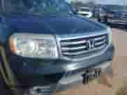 2014 Honda Pilot EX-L z VIN 5FNYF3H65EB002248, wystawiony jako IAAI lot #41689850 z przebiegiem 157 234 mil mil oraz . Historia ofert i sprzedaży dostępna na DreamBid. Obrazek 6.