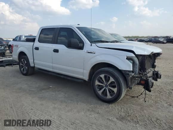 2019 Ford F-150 XL with VIN 1FTEW1CP9KKE34878, listed as a Copart auction lot 87386065 with 129,919 mi miles and Salvage title. Bid and sale history available at DreamBid. Image 4.