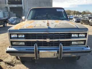 1990 Chevrolet Suburban с VIN 1GNEV16K4LF109799, выставлен на аукционе Copart как лот 80185334 с пробегом 288 453 миль миль и Списание • Salvage title. История ставок и продаж доступна на DreamBid. Изображение 5.