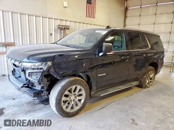 2021 Chevrolet Tahoe Premier z VIN 1GNSKSKDXMR256993, wystawiony jako Copart lot #80742055 z przebiegiem 79 860 mil mil oraz Szkoda całkowita • Salvage title. Historia ofert i sprzedaży dostępna na DreamBid. Obrazek 1.
