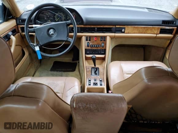1983 Mercedes-Benz 380 SEC with VIN WDBCA43A3DB008043, listed as a Copart auction lot 65991095 with 146,606 mi miles and Salvage title. Bid and sale history available at DreamBid. Image 8.