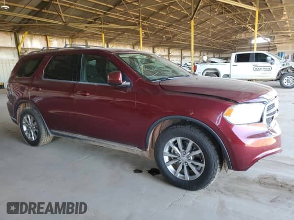 2017 Dodge Durango SXT with VIN 1C4RDHAG2HC850552, listed as a Copart auction lot 85598545 with 144,477 mi miles and Salvage title. Bid and sale history available at DreamBid. Image 4.