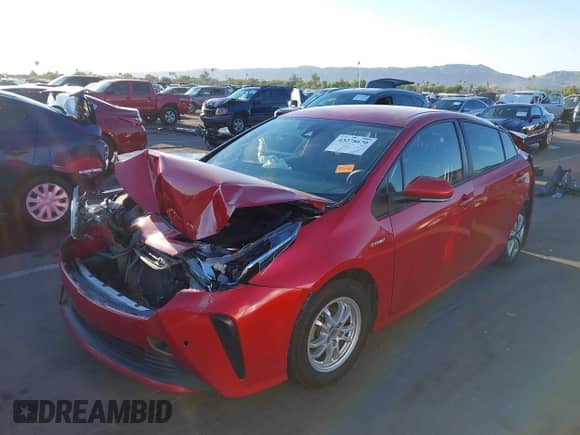 2021 Toyota Prius L Eco with VIN JTDKAMFU6M3152201, listed as a IAAI auction lot 43278670 with 144,414 mi miles and . Bid and sale history available at DreamBid. Image 17.