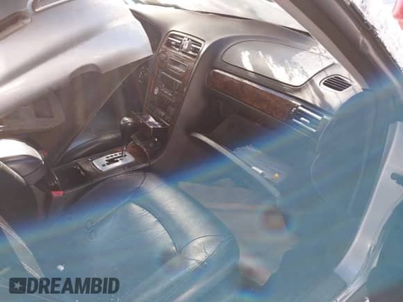 2003 Hyundai XG с VIN KMHFU45E73A242885, выставлен на аукционе IAAI как лот 41367328 с пробегом Не указан миль и . История ставок и продаж доступна на DreamBid. Изображение 5.