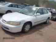 2000 Honda Accord LX z VIN 1HGCG5641YA131445, wystawiony jako IAAI lot #42441064 z przebiegiem 208 017 mil mil oraz . Historia ofert i sprzedaży dostępna na DreamBid. Obrazek 2.