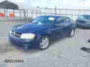 2013 Dodge Avenger SXT with VIN 1C3CDZCBXDN615817, listed as a IAAI auction lot 43282287 with 245,259 mi miles and . Bid and sale history available at DreamBid. Image 2.