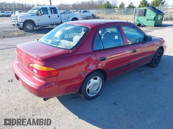 2001 Chevrolet Prizm z VIN 1Y1SK52851Z420509, wystawiony jako IAAI lot #41601286 z przebiegiem 80 359 mil mil oraz . Historia ofert i sprzedaży dostępna na DreamBid. Obrazek 4.