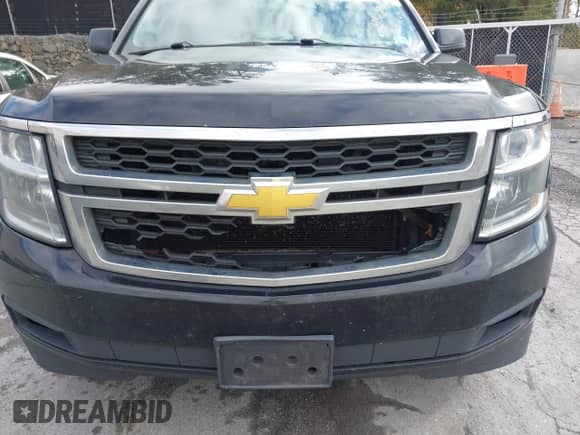 2015 Chevrolet Tahoe LS z VIN 1GNSKAKC6FR578745, wystawiony jako IAAI lot #43481431 z przebiegiem 452 330 mil mil oraz . Historia ofert i sprzedaży dostępna na DreamBid. Obrazek 17.