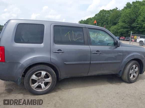 2014 Honda Pilot EX-L z VIN 5FNYF4H5XEB025361, wystawiony jako IAAI lot #42600092 z przebiegiem 169 019 mil mil oraz . Historia ofert i sprzedaży dostępna na DreamBid. Obrazek 13.