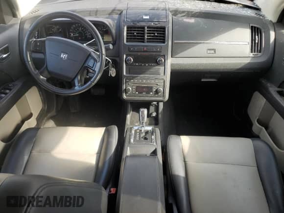 2009 Dodge Journey R/T z VIN 3D4GG67V39T171021, wystawiony jako Copart lot #54162425 z przebiegiem 18 891 mil mil oraz Czysty tytuł • Clean title. Historia ofert i sprzedaży dostępna na DreamBid. Obrazek 8.