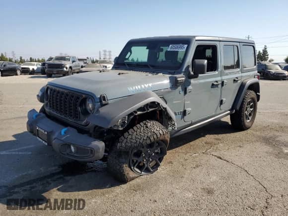 2024 Jeep Wrangler Willys with VIN 1C4RJXN69RW217616, listed as a Copart auction lot 68506995 with 23,923 mi miles and Salvage title. Bid and sale history available at DreamBid. Image 1.