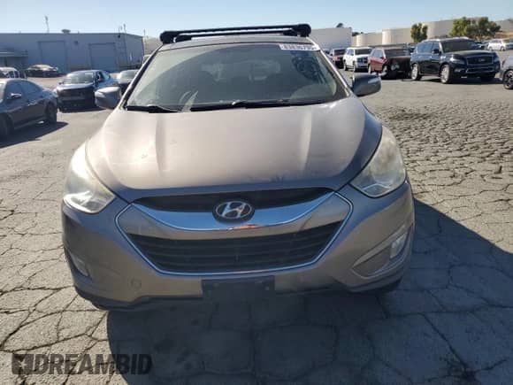 2012 Hyundai Tucson Limited с VIN KM8JUCAC5CU544618, выставлен на аукционе Copart как лот 83836795 с пробегом 141 381 миль миль и Списание • Salvage title. История ставок и продаж доступна на DreamBid. Изображение 5.