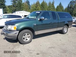 2002 Ford F-150 XL with VIN 2FTRX17L12CA16342, listed as a Copart auction lot 72035795 with 115,151 mi miles and Salvage title. Bid and sale history available at DreamBid. Image 1.