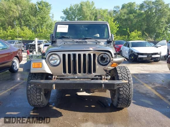 2005 Jeep Wrangler Rubicon z VIN 1J4FA69S35P380944, wystawiony jako IAAI lot #42095879 z przebiegiem 182 176 mil mil oraz . Historia ofert i sprzedaży dostępna na DreamBid. Obrazek 12.