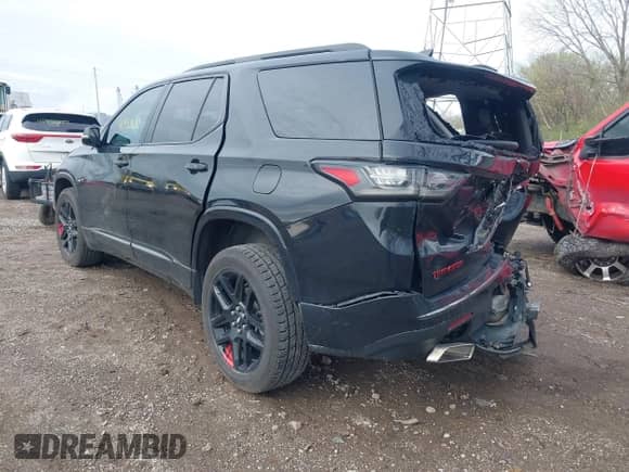 2020 Chevrolet Traverse Premier with VIN 1GNERKKW4LJ106546, listed as a IAAI auction lot 41953652 with 101,884 mi miles and . Bid and sale history available at DreamBid. Image 3.