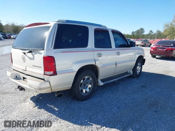 2004 Cadillac Escalade with VIN 1GYEC63TX4R299594, listed as a IAAI auction lot 41833184 with 320,822 mi miles and . Bid and sale history available at DreamBid. Image 4.