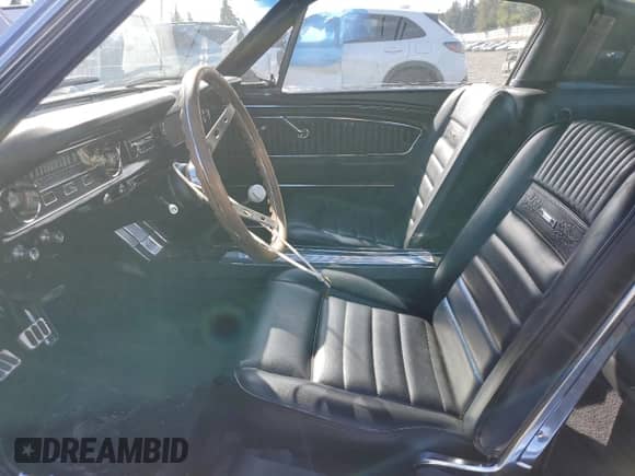 1965 Ford Mustang with VIN 5R09T186141, listed as a Copart auction lot 82097995 with 95,802 mi miles and Salvage title. Bid and sale history available at DreamBid. Image 7.