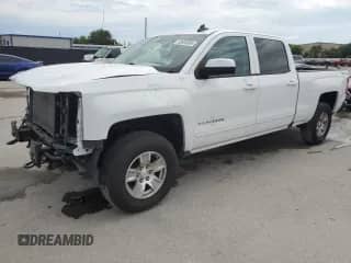 2017 Chevrolet Silverado 1500 LT with VIN 3GCUKREC5HG299429, listed as a Copart auction lot 65595985 with 152,164 mi miles and Salvage title. Bid and sale history available at DreamBid. Image 1.