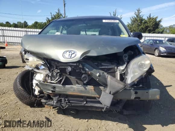 2012 Toyota Sienna with VIN 5TDZK3DC4CS184450, listed as a Copart auction lot 71284385 with 207,878 mi miles and Salvage title. Bid and sale history available at DreamBid. Image 5.