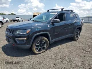 2017 Jeep Compass Trailhawk with VIN 3C4NJDDB6HT631761, listed as a Copart auction lot 62759555 with 94,528 mi miles and Salvage title. Bid and sale history available at DreamBid. Image 1.