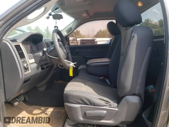 2012 Ram 1500 Express with VIN 3C6JD7AT7CG280484, listed as a Copart auction lot 54769825 with 128,666 mi miles and Salvage title. Bid and sale history available at DreamBid. Image 7.