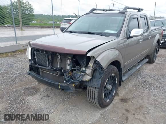 2009 Nissan Frontier SE with VIN 1N6AD09WX9C423595, listed as a IAAI auction lot 42210046 with 117,142 mi miles and . Bid and sale history available at DreamBid. Image 2.