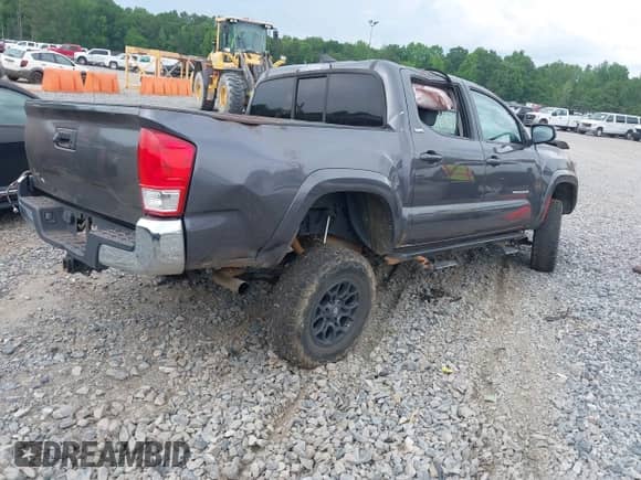 2017 Toyota Tacoma SR5 with VIN 5TFAZ5CN5HX036932, listed as a IAAI auction lot 42112689 with 120,379 mi miles and . Bid and sale history available at DreamBid. Image 4.