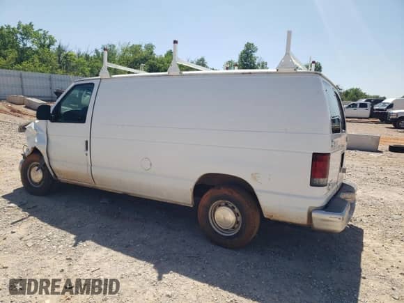2002 Ford Econoline Cargo with VIN 1FTRE14272HA73588, listed as a Copart auction lot 56753015 with 243,587 mi miles and Salvage title. Bid and sale history available at DreamBid. Image 2.