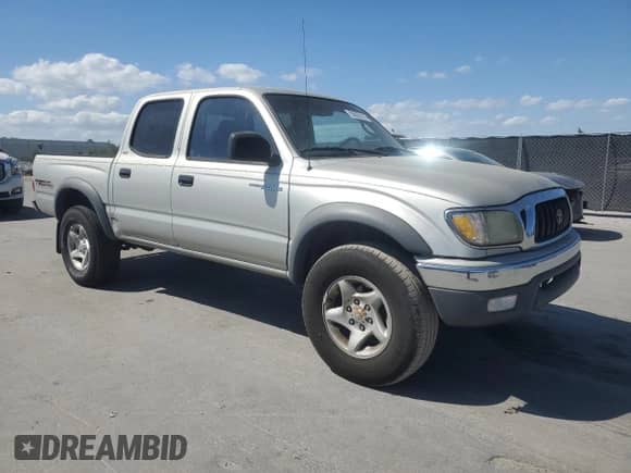 2002 Toyota Tacoma PreRunner z VIN 5TEGM92N82Z052575, wystawiony jako Copart lot #50062815 z przebiegiem 314 154 mil mil oraz Czysty tytuł • Clean title. Historia ofert i sprzedaży dostępna na DreamBid. Obrazek 4.