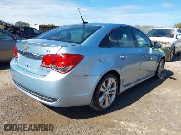 2012 Chevrolet Cruze LTZ with VIN 1G1PH5SCXC7328851, listed as a IAAI auction lot 43376789 with 232,900 mi miles and . Bid and sale history available at DreamBid. Image 4.