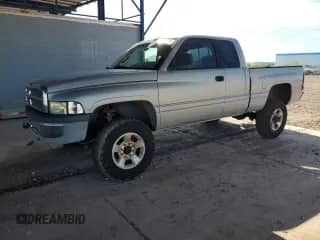 1999 Dodge 2500 with VIN 1B7KF2364XJ648660, listed as a Copart auction lot 69264725 with 167,545 mi miles and Salvage title. Bid and sale history available at DreamBid. Image 1.