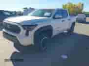 2024 Toyota Tacoma SR5 with VIN 3TYLB5JN9RT004030, listed as a IAAI auction lot 43486815 with 27,397 mi miles and . Bid and sale history available at DreamBid. Image 2.