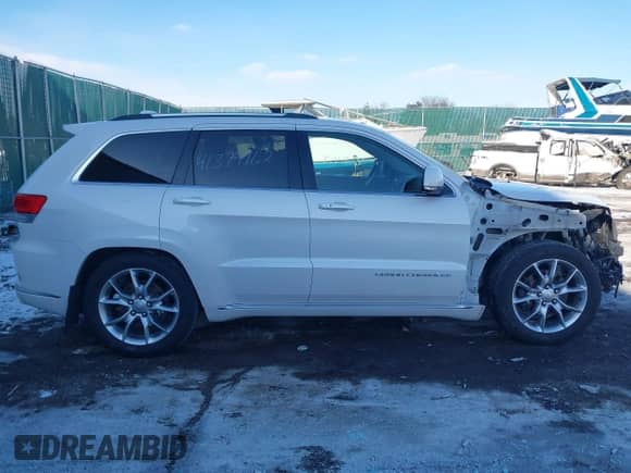 2016 Jeep Grand Cherokee Summit with VIN 1C4RJFJTXGC489631, listed as a IAAI auction lot 41379162 with 97,605 mi miles and . Bid and sale history available at DreamBid. Image 14.