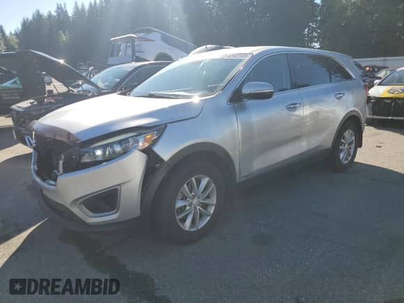 2016 Kia Sorento LX with VIN 5XYPG4A37GG019014, listed as a Copart auction lot 82502305 with 124,491 mi miles and Clean title. Bid and sale history available at DreamBid. Image 1.