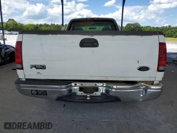 2001 Ford F-150 XL z VIN 1FTRF17W41NA93907, wystawiony jako Copart lot #64889165 z przebiegiem Nie podano mil oraz Szkoda całkowita • Salvage title. Historia ofert i sprzedaży dostępna na DreamBid. Obrazek 6.