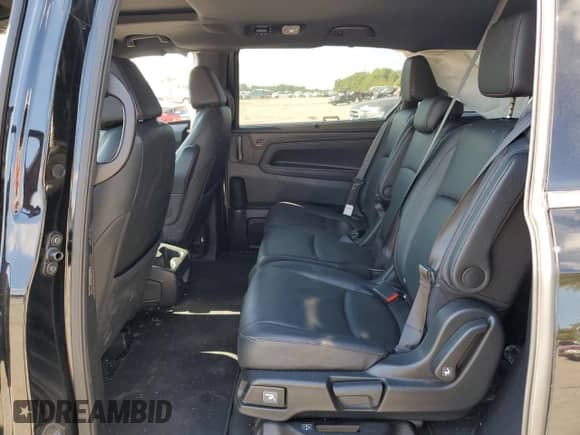 2024 Honda Odyssey Sport z VIN 5FNRL6H7XRB060630, wystawiony jako Copart lot #70953185 z przebiegiem Nie podano mil oraz Szkoda całkowita • Salvage title. Historia ofert i sprzedaży dostępna na DreamBid. Obrazek 11.