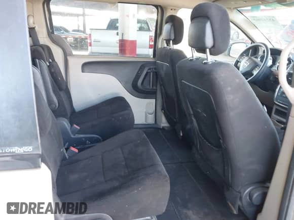 2012 Dodge Grand Caravan SE z VIN 2C4RDGBG7CR396145, wystawiony jako IAAI lot #43242965 z przebiegiem 134 245 mil mil oraz . Historia ofert i sprzedaży dostępna na DreamBid. Obrazek 8.