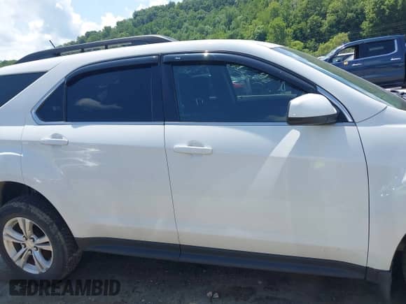 2015 Chevrolet Equinox LT z VIN 2GNFLFE36F6195374, wystawiony jako IAAI lot #42610707 z przebiegiem 169 836 mil mil oraz . Historia ofert i sprzedaży dostępna na DreamBid. Obrazek 14.